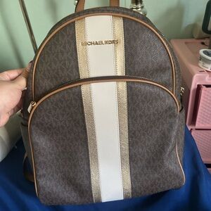 Michael Kors Brown and Cream Backpack with Monogram Pattern and Golden Hardware